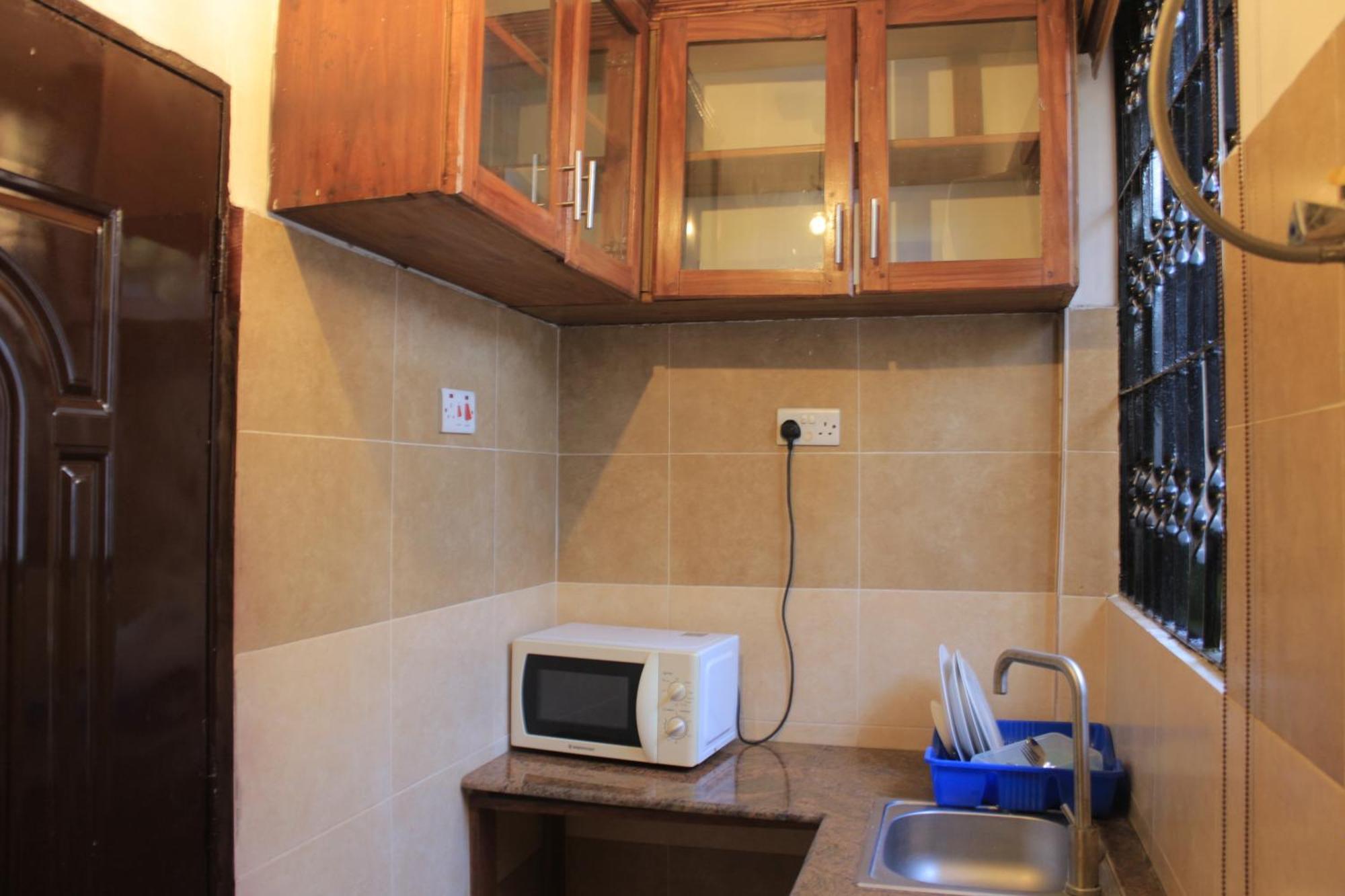Mikocheni Condo Hotel & Apartments Дар-эс-Саламе Экстерьер фото